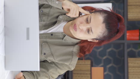 Vertical-video-of-Business-woman-nervous-and-stressed-at-desk.